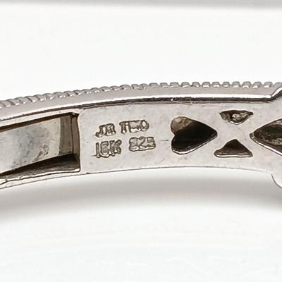 LOT 310: Judith Ripka 925 Sterling Silver and 18K Gold Cuff Bracelet with Blue Topaz Center