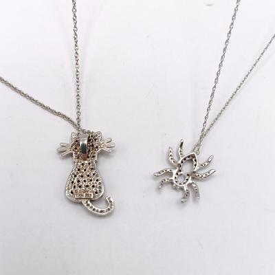 LOT 309: Silver-Tone Cat and Spider Rhinestone Necklaces