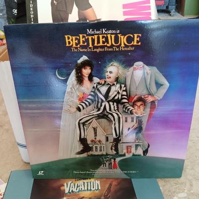 LOT 138-302: Large Collection of LaserDisc Movies - Beetlejuice, Independence Day, Mrs. Doubtfire & More