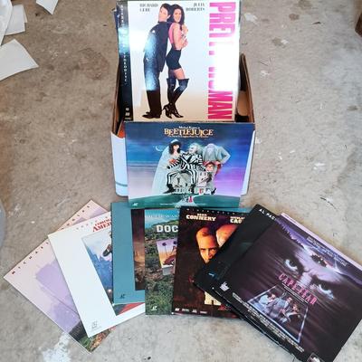 LOT 138-302: Large Collection of LaserDisc Movies - Beetlejuice, Independence Day, Mrs. Doubtfire & More