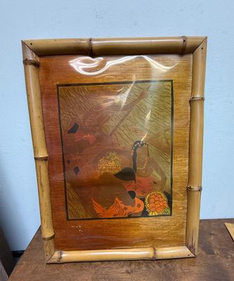 Sale Photo Thumbnail #121: Similar in style to Paul Gauguin's art from Tahiti. In fair to good condition. There is some water damage showing on the matting and the plastic cover is warped, but artwork looks good underneath.