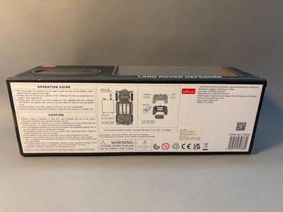 RASTAR - 1:24 Red Land Rover Defender - Remote Controlled Racing Car