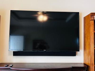 65” SAMSUNG SMART TV WITH WALL MOUNT AND 54” VIZIO SOUNDBAR SURROUND SOUND BLUETOOTH SYSTEM