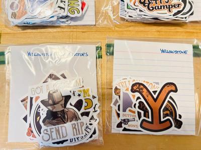 A BUNCH OF NICELY SORTED STICKERS, HOLE PUNCH, MUSIC BULLET SPEAKER, MAGNETS, SMALL ORGANIZERS AND MORE!
