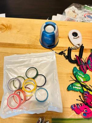 A BUNCH OF NICELY SORTED STICKERS, HOLE PUNCH, MUSIC BULLET SPEAKER, MAGNETS, SMALL ORGANIZERS AND MORE!