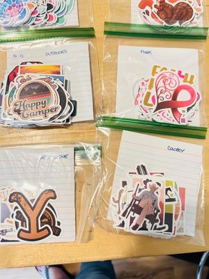 A BUNCH OF NICELY SORTED STICKERS, HOLE PUNCH, MUSIC BULLET SPEAKER, MAGNETS, SMALL ORGANIZERS AND MORE!