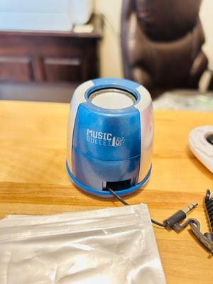 A BUNCH OF NICELY SORTED STICKERS, HOLE PUNCH, MUSIC BULLET SPEAKER, MAGNETS, SMALL ORGANIZERS AND MORE!