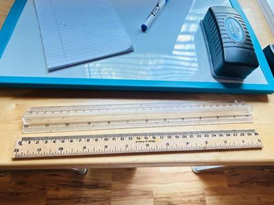 PHILLIPS AUDIO PLAYER, BUSINESS CARD HOLDER, DRAFTING STENCILS, 3 RING BINDERS, MINI SPEAKER, DRY ERASE BOARD AND OTHER SUPPLIES