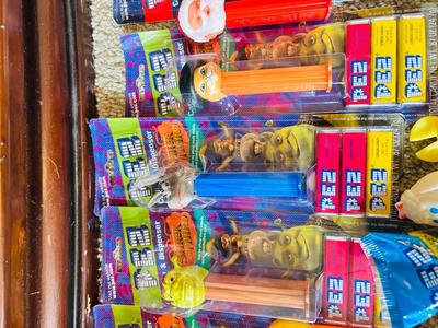 SHREK CHARACTERS AND AN ASSORTMENT OF OTHER PEZ DISPENSERS IN-&-OUT OF PACKAGES