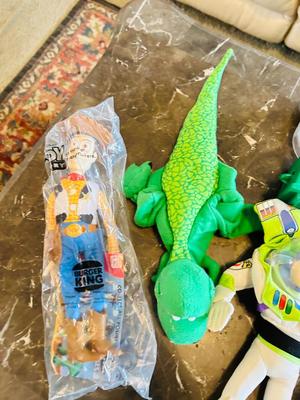 LION KING CANDY DISPERSER, FIVEL GOES WEST GUY, AND TOY STORY CHARACTERS