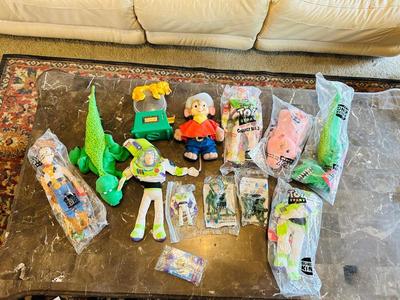 LION KING CANDY DISPERSER, FIVEL GOES WEST GUY, AND TOY STORY CHARACTERS