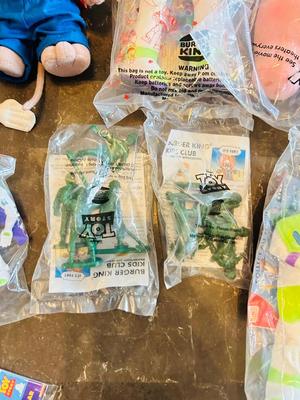 LION KING CANDY DISPERSER, FIVEL GOES WEST GUY, AND TOY STORY CHARACTERS