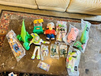 LION KING CANDY DISPERSER, FIVEL GOES WEST GUY, AND TOY STORY CHARACTERS