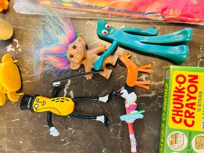 A VARIETY OF DIFFERENT TOYS AND OTHER ITEMS EVEN AN INFLATABLE SINCLAIR DINOSAUR