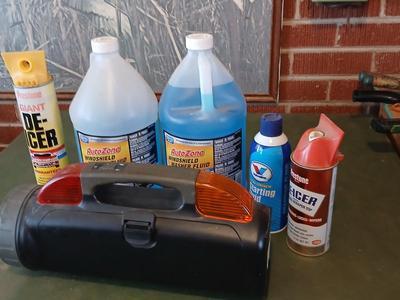 Cold Weather Auto Lot – Washer Fluid, De-Icer, Starting Fluid & Safety Light with an am/fm radio