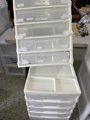 Two sets plastic storage drawers