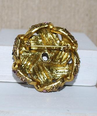 Marked "MONET"--Rows of AMETHYST, CHAMPAGNE & PURPLE Colored Stones BROOCH (2" Diam.) in a RIBBON Design on a Gold...
