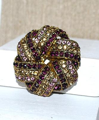 Marked "MONET"--Rows of AMETHYST, CHAMPAGNE & PURPLE Colored Stones BROOCH (2" Diam.) in a RIBBON Design on a Gold...