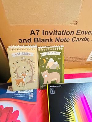 200 ct PACK OF BLANK INVITATIONS AND ENVELOPES, 2 LARGE ROLLS OF VINYL, AND AN ARRAY OF NOTEPADS AND COLORED PAPER