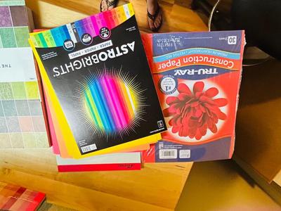 200 ct PACK OF BLANK INVITATIONS AND ENVELOPES, 2 LARGE ROLLS OF VINYL, AND AN ARRAY OF NOTEPADS AND COLORED PAPER