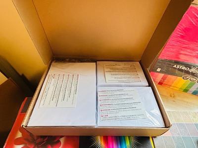 200 ct PACK OF BLANK INVITATIONS AND ENVELOPES, 2 LARGE ROLLS OF VINYL, AND AN ARRAY OF NOTEPADS AND COLORED PAPER