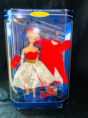 1997 LIMITED EDITION OF THE 1962 FASHION DOLL “SILKEN FLAME BARBIE”