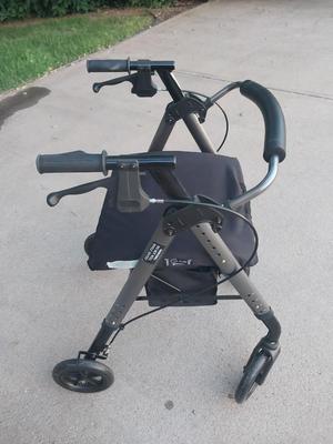 Sale Photo Thumbnail #214: SERVES AS A STAND-UP WALKER AND SEATED TRANSPORTING CHAIR