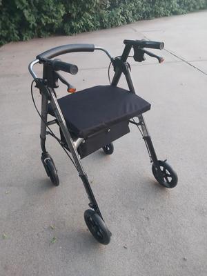 Sale Photo Thumbnail #212: SERVES AS A STAND-UP WALKER AND SEATED TRANSPORTING CHAIR