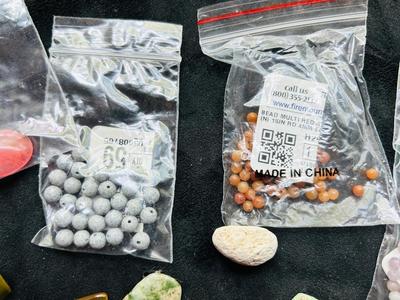 A VARIETY OF STONE BEADS AND OTHERS READY FOR CRAFTING