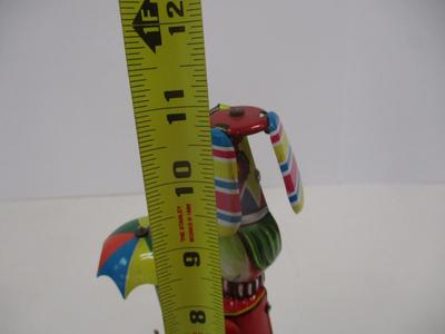 Tin Toy Dancing Duck On A Drum w/ Umbrella Bright Colors Rare Vintage Missing Key