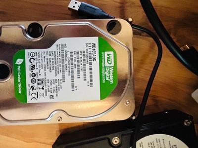 HP MONITOR, POWER STRIP, HARD DRIVES, LOGITECH CAMERA