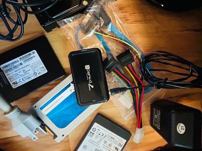 HP MONITOR, POWER STRIP, HARD DRIVES, LOGITECH CAMERA