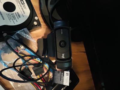 HP MONITOR, POWER STRIP, HARD DRIVES, LOGITECH CAMERA