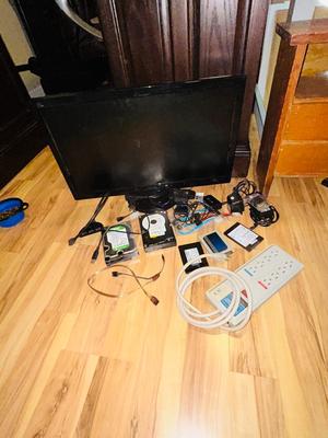 HP MONITOR, POWER STRIP, HARD DRIVES, LOGITECH CAMERA