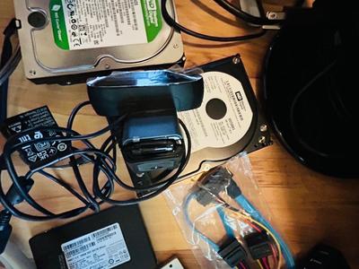 HP MONITOR, POWER STRIP, HARD DRIVES, LOGITECH CAMERA