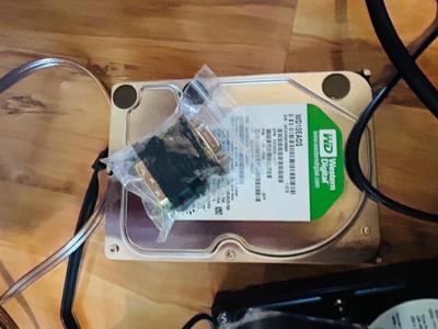 HP MONITOR, POWER STRIP, HARD DRIVES, LOGITECH CAMERA