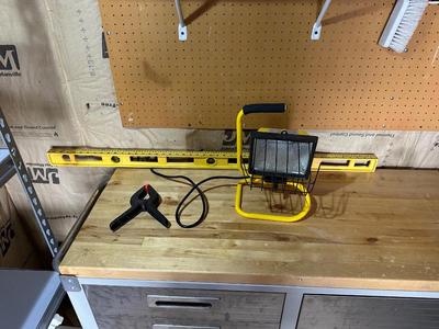 HALOGEN LAMP, 4 FT LEVEL AND A CLAMP