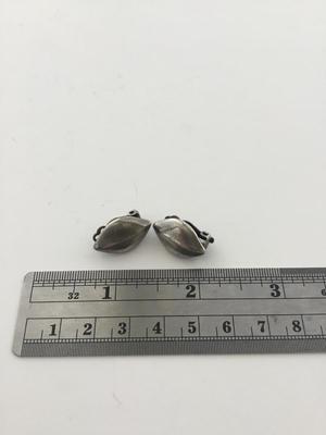 Silver tone vintage clip on earring