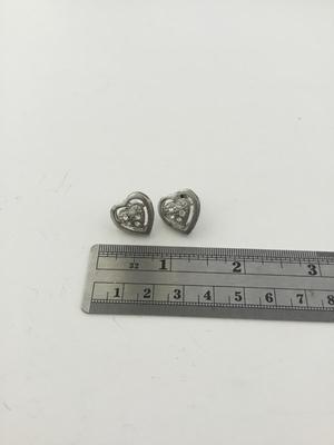 Unmarked silver tone heart stud earrings