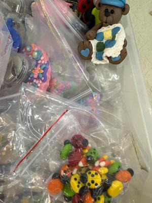 Assortment of polymer clay items in process and completed