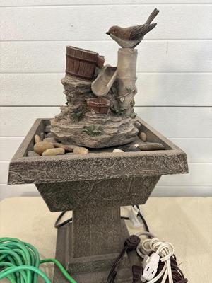Bird fountain and extension cords