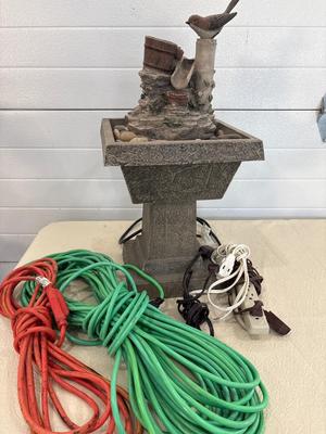 Bird fountain and extension cords