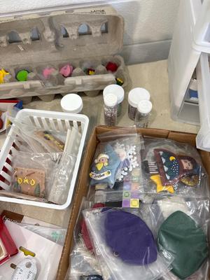 Tote of completed, handmade polymer figurines