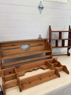 Three display shelving units