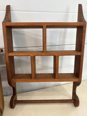 Three display shelving units
