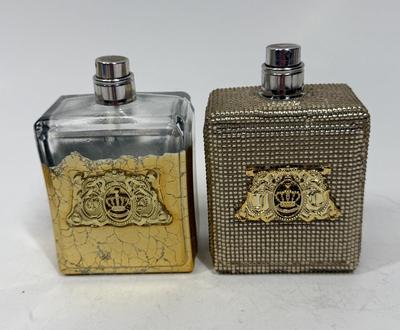 Sale Photo Thumbnail #431: Viva La Juicy Limited Edition 3.4oz Parfum Spray with gold beaded glass bottle (still contains some perfume), and another Viva La Juicy Limited Edition 3.4oz Parfum Spray with gold gilt glass bottle (worn/crackled finish), that one appears to be empty.