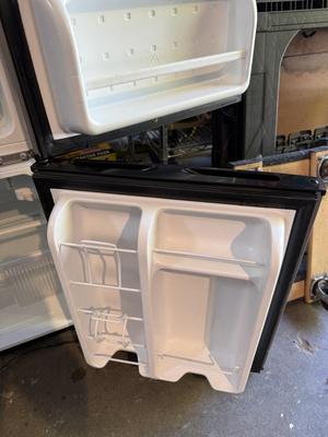 Sale Photo Thumbnail #44: Small Refrigerator. 
In very good condition. 
Model FFPS31B2QM
33 inch tall
20 inch deep
19 inch wide