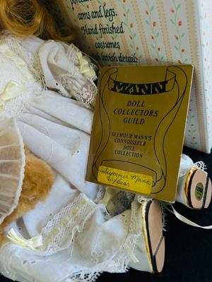 MYD PORCELAIN DOLL W/CERTIFICATE AND SEYMOUR MANN DOLL