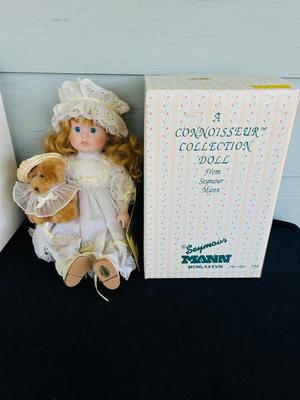 MYD PORCELAIN DOLL W/CERTIFICATE AND SEYMOUR MANN DOLL