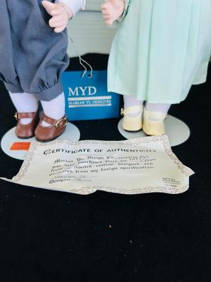 MYD PORCELAIN DOLL W/CERTIFICATE AND SEYMOUR MANN DOLL